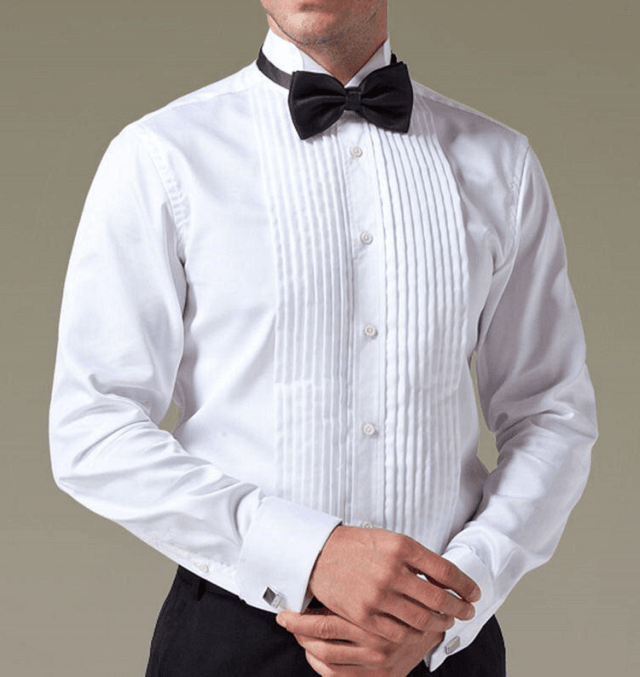 پیراهن رسمی سفید به همراه پاپیون و دکمه سر دست مشکی و شلوار مشکی