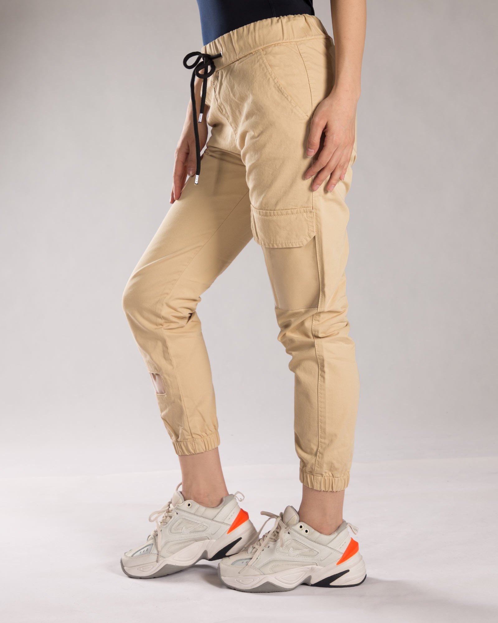 شلوار کتان دخترانه گت دار - کرمی سیر - بغل