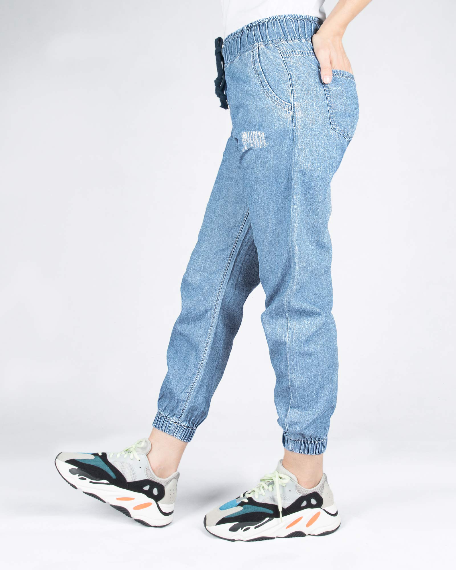 شلوار جین کاغذی زاپ دار کمر کش - آبی روشن - نیم رخ