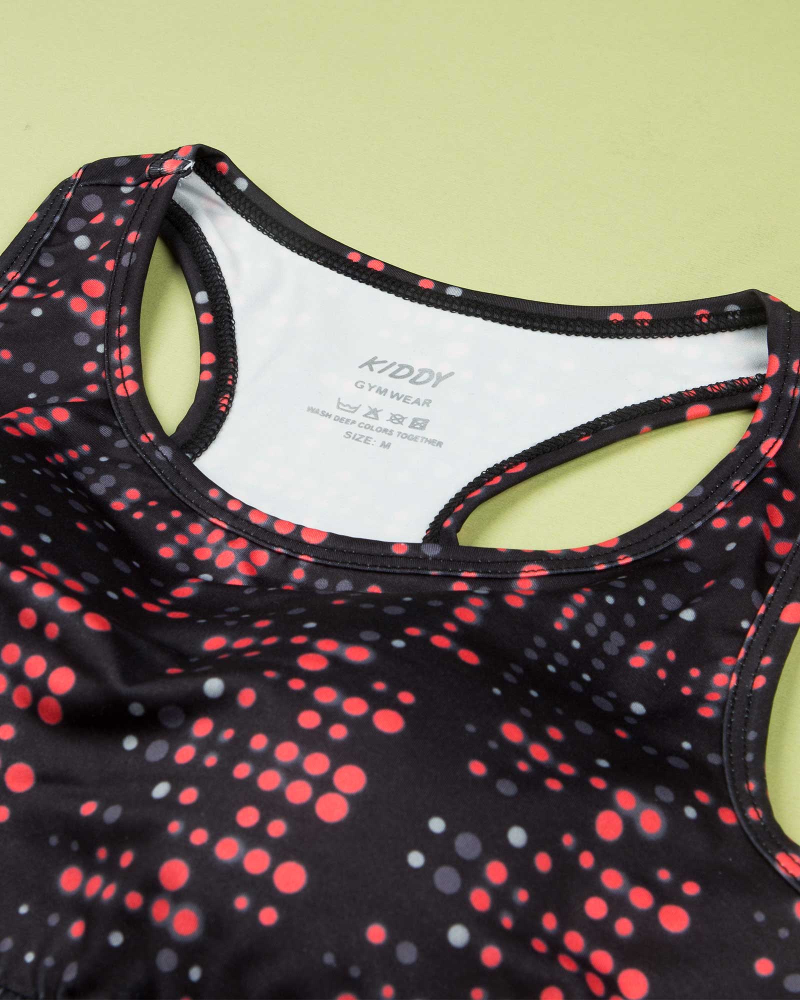 نیم تنه ورزشی خال خالی - قرمز روشن - طرح‌دار